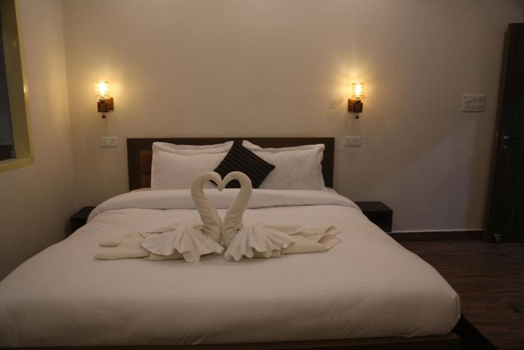 Deluxe bed setup with folded towels