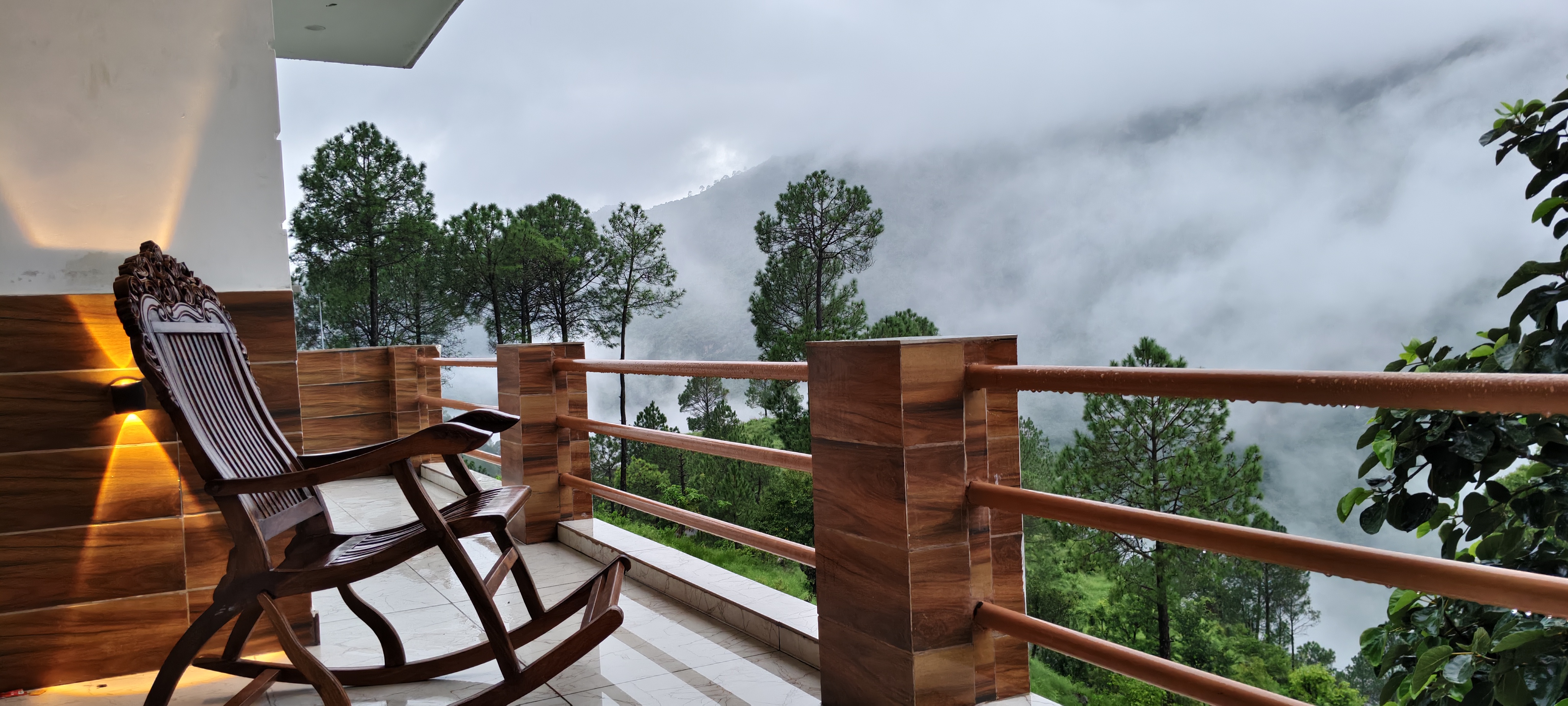 Balcony rocking chairs with cloud view